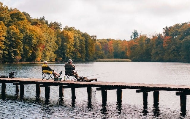 Two Men Fishing on Lake